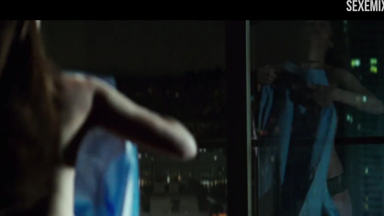 Naked Dakota Johnson near the window, scene - Fifty Shades Darker