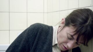 Charlotte Gainsbourg masturbates while sitting in the toilet, scene in Nymphomaniac: Vol. II