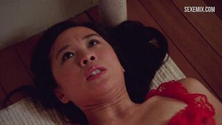 Sook-Yin Lee se masturbe avec un gode vibrant, scène dans Shortbus