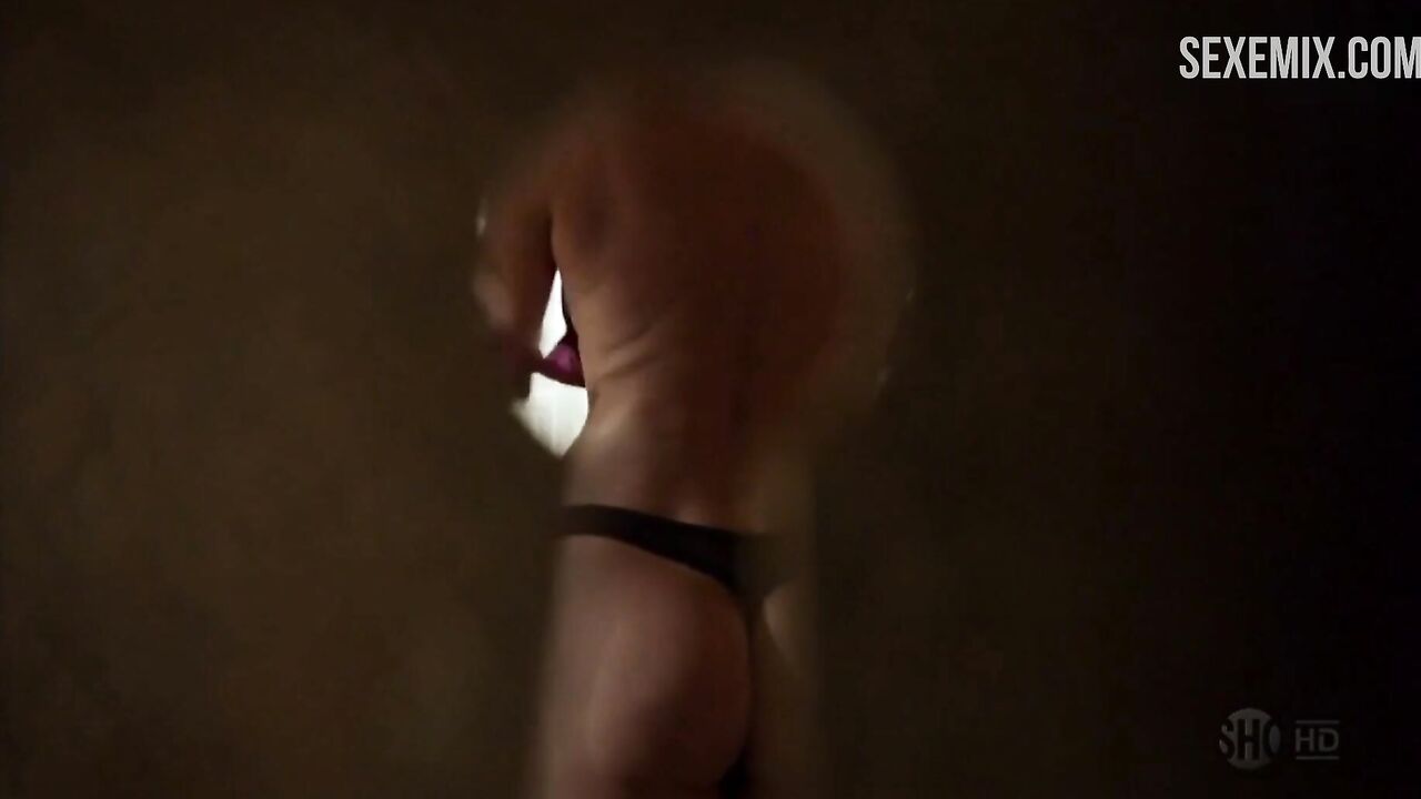 Molly Price being watched through a keyhole, scene in Shameless