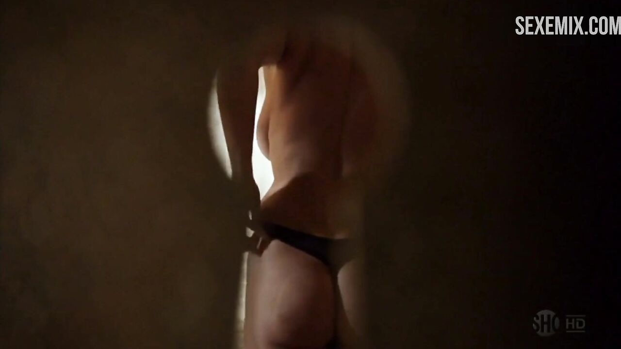 Molly Price being watched through a keyhole, scene in Shameless