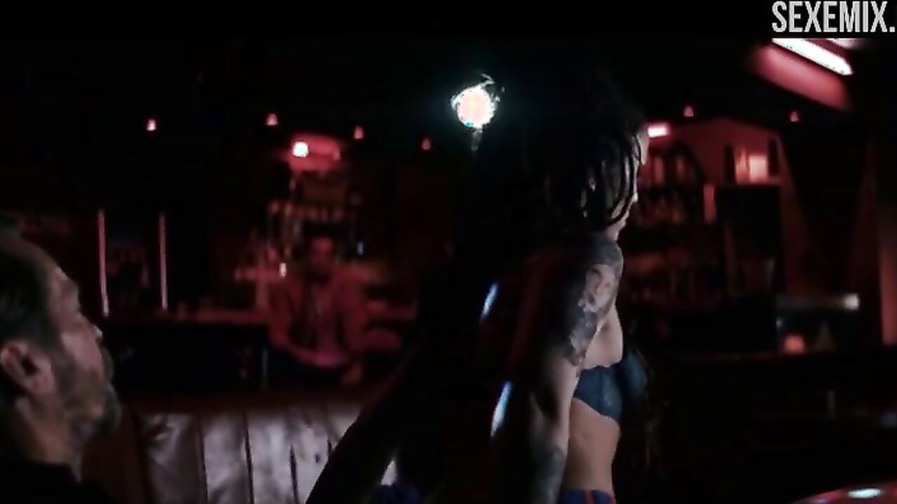 Peri Baumeister dancing in a striptease bar, scene in 9 Tage wach