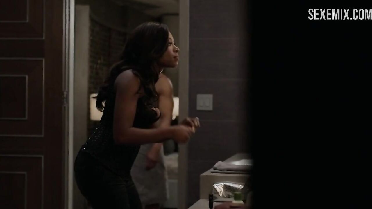 Naturi Naughton in a sexy black dress, scene in Power