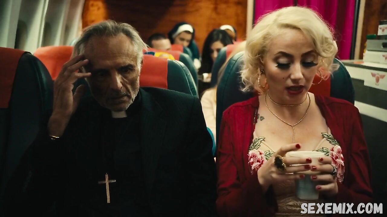 Jin N Tonic shows us her beautiful cleavage, scene in Exorcism At 60,000 Feet