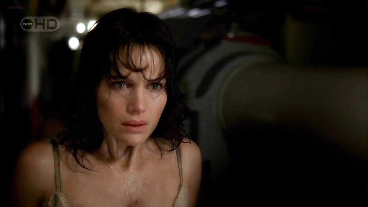 Carla Gugino sexy -  sex scene from Threshold s01e01 (2005)