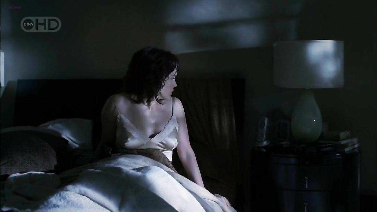 Carla Gugino sexy -  sex scene from Threshold s01e01 (2005)