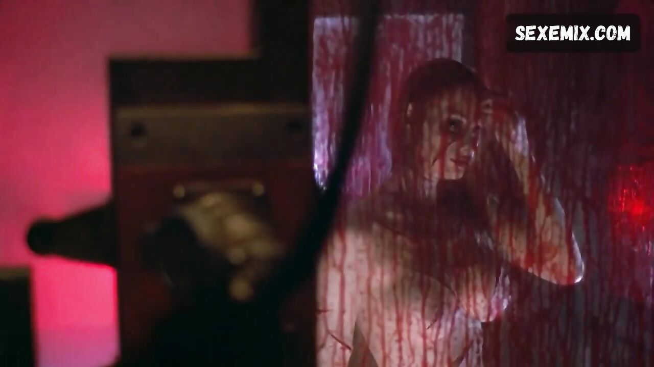 Shawna Loyer breasts, scene in Thir13en Ghosts (2001)