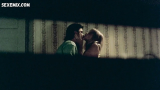 Man undresses Jill McWhirter, scene in The Dentist 2 (1998)