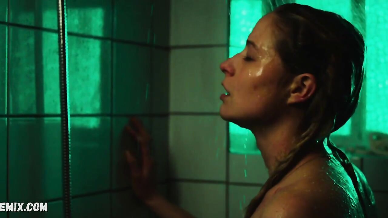 Niamh Algar takes a shower, scene in Deceit s01e01-03 (2021 )