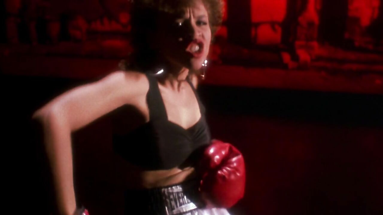 Rosie Perez in the clip is seen wearing sexy tight blue dress - Do the Right Thing (1989)