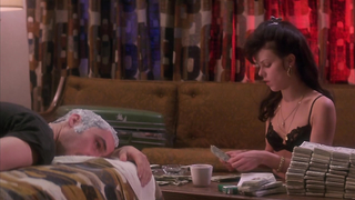 Debi Mazar has nice tits during sex, scene from - Money for Nothing (1993)