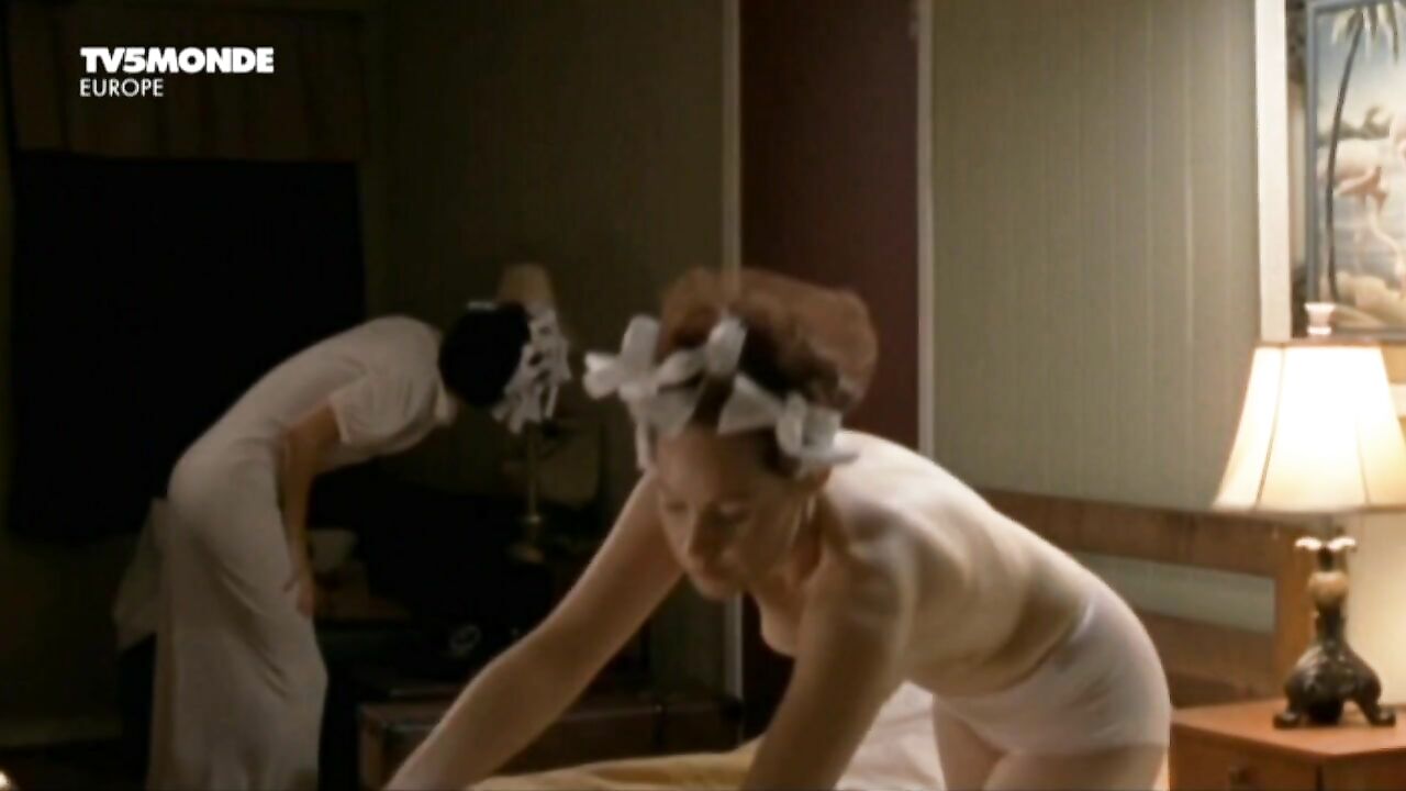 Adelaide Leroux erotic scene from Cigarettes et bas nylon (2010)