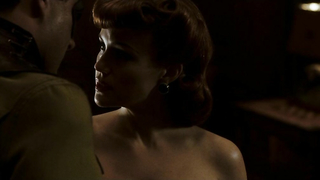 Carla Gugino sexy, escena erótica de Watchmen (2009)